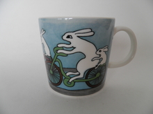 Cycling Bunnies Mug Heljä Liukko-Sundström 